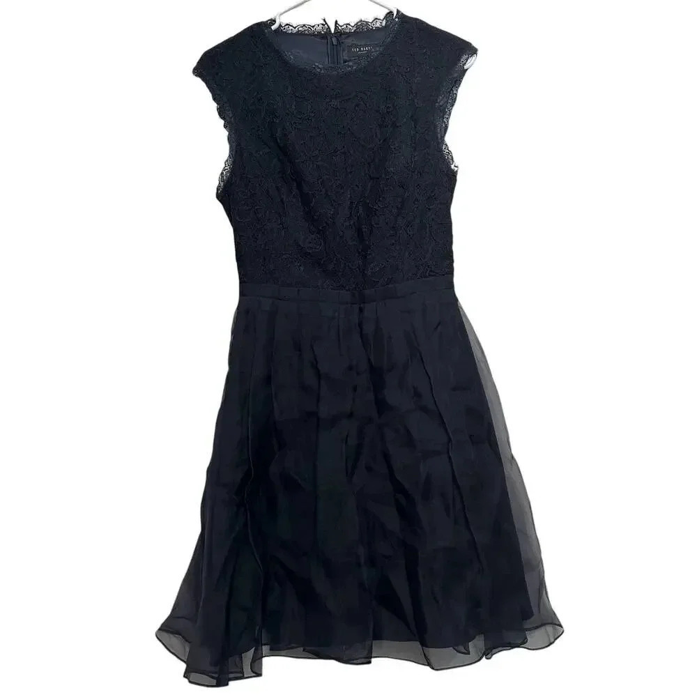 Ted Baker women’s Jessika Fit and Flare dress in black. Size 4